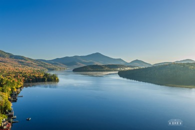 Experience the ultimate Adirondack lifestyle in this on Whiteface Club and Resort in New York - for sale on GolfHomes.com, golf home, golf lot