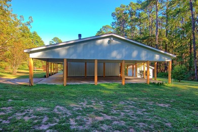 This 2 story beauty backs up to the national forest and is a 3 on Pendleton Harbor in Texas - for sale on GolfHomes.com, golf home, golf lot