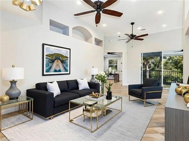 Step into a home that feels equal parts refined and on West Bay Beach and Golf Club in Florida - for sale on GolfHomes.com, golf home, golf lot