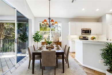 Step into a home that feels equal parts refined and on West Bay Beach and Golf Club in Florida - for sale on GolfHomes.com, golf home, golf lot