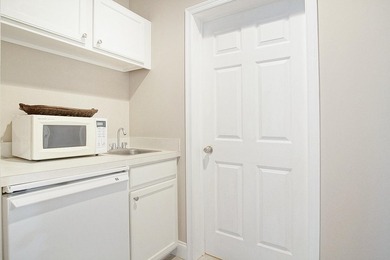 Golf course views, a waterfront lot, and two seperate units all on The Legacy Golf and Tennis Club in Florida - for sale on GolfHomes.com, golf home, golf lot