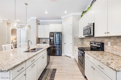 Priced to sell! The stunning saltwater pool is the focal point on Pelican Preserve Golf Club in Florida - for sale on GolfHomes.com, golf home, golf lot