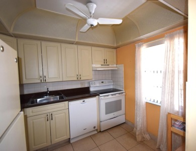 Enjoy serene golf course views and resort-style amenities in on Oriole Golf and Tennis Club in Florida - for sale on GolfHomes.com, golf home, golf lot