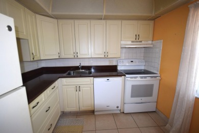 Enjoy serene golf course views and resort-style amenities in on Oriole Golf and Tennis Club in Florida - for sale on GolfHomes.com, golf home, golf lot