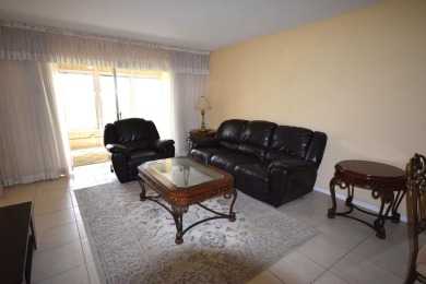 Enjoy serene golf course views and resort-style amenities in on Oriole Golf and Tennis Club in Florida - for sale on GolfHomes.com, golf home, golf lot