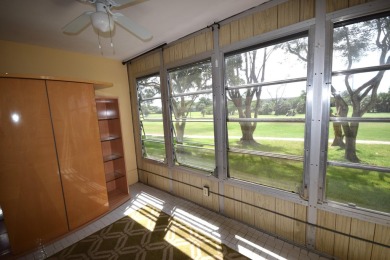 Enjoy serene golf course views and resort-style amenities in on Oriole Golf and Tennis Club in Florida - for sale on GolfHomes.com, golf home, golf lot