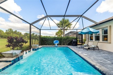 Priced to sell! The stunning saltwater pool is the focal point on Pelican Preserve Golf Club in Florida - for sale on GolfHomes.com, golf home, golf lot