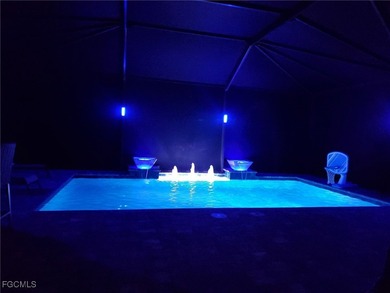 Priced to sell! The stunning saltwater pool is the focal point on Pelican Preserve Golf Club in Florida - for sale on GolfHomes.com, golf home, golf lot