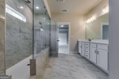 Discover the Georgetown plan by Paran Homes, located in the on Traditions of Braselton Golf Club in Georgia - for sale on GolfHomes.com, golf home, golf lot