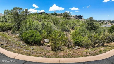 Nestled within the prestigious Prescott Lakes Golf Course on Prescott Lakes Golf and Country Club in Arizona - for sale on GolfHomes.com, golf home, golf lot