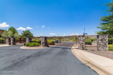 Nestled within the prestigious Prescott Lakes Golf Course on Prescott Lakes Golf and Country Club in Arizona - for sale on GolfHomes.com, golf home, golf lot