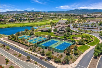 Nestled within the prestigious Prescott Lakes Golf Course on Prescott Lakes Golf and Country Club in Arizona - for sale on GolfHomes.com, golf home, golf lot