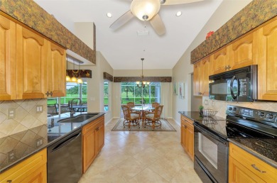 Attractive three bedroom, two bath, pool home, with golf course on Waterford Golf Club in Florida - for sale on GolfHomes.com, golf home, golf lot