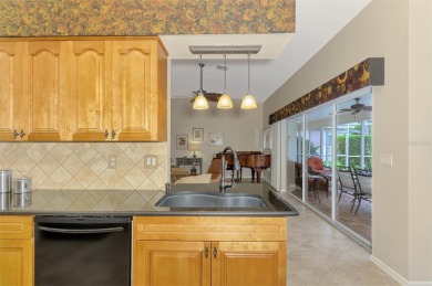Attractive three bedroom, two bath, pool home, with golf course on Waterford Golf Club in Florida - for sale on GolfHomes.com, golf home, golf lot