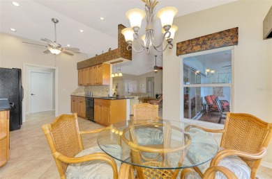 Attractive three bedroom, two bath, pool home, with golf course on Waterford Golf Club in Florida - for sale on GolfHomes.com, golf home, golf lot