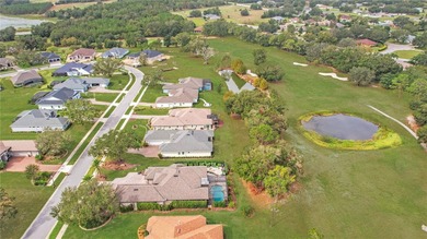 Experience life to the fullest in this 4 bedroom / 3 full bath on Harbor Hills Country Club in Florida - for sale on GolfHomes.com, golf home, golf lot