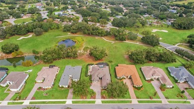 Experience life to the fullest in this 4 bedroom / 3 full bath on Harbor Hills Country Club in Florida - for sale on GolfHomes.com, golf home, golf lot