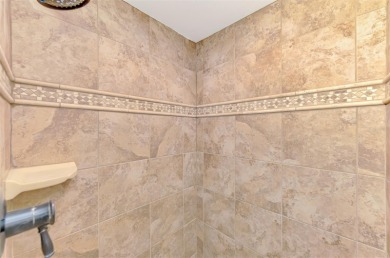 Attractive three bedroom, two bath, pool home, with golf course on Waterford Golf Club in Florida - for sale on GolfHomes.com, golf home, golf lot