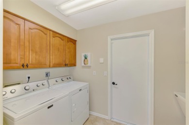 Attractive three bedroom, two bath, pool home, with golf course on Waterford Golf Club in Florida - for sale on GolfHomes.com, golf home, golf lot