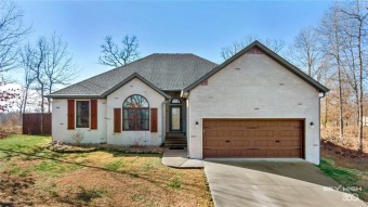 Start the new year off in this beautifully updated home sitting on Bella Vista Country Club - Scottsdale in Arkansas - for sale on GolfHomes.com, golf home, golf lot