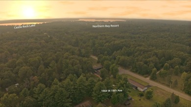 This charming Northwoods-style 1 bed, 1 bath cabin is just on Northern Bay Golf Resort and Marina in Wisconsin - for sale on GolfHomes.com, golf home, golf lot
