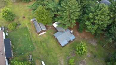 This charming Northwoods-style 1 bed, 1 bath cabin is just on Northern Bay Golf Resort and Marina in Wisconsin - for sale on GolfHomes.com, golf home, golf lot