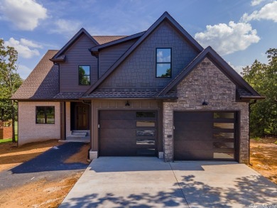 This is an absolutely beautiful new construction home that backs on Greystone Country Club in Arkansas - for sale on GolfHomes.com, golf home, golf lot