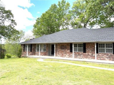 Nice two level brick home in a gorgeous area close to the lake on Prairie Creek Country Club in Arkansas - for sale on GolfHomes.com, golf home, golf lot