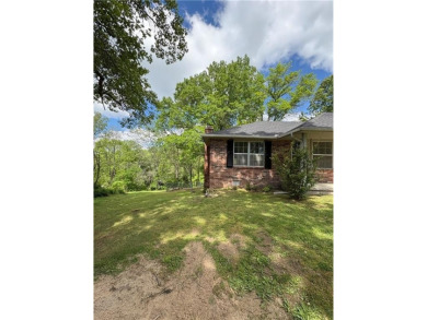Nice two level brick home in a gorgeous area close to the lake on Prairie Creek Country Club in Arkansas - for sale on GolfHomes.com, golf home, golf lot