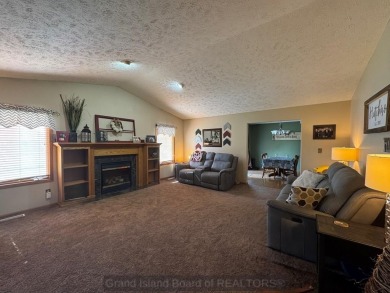 This beautiful home is located right by Indianhead Golf Course! on Indianhead Golf Club in Nebraska - for sale on GolfHomes.com, golf home, golf lot