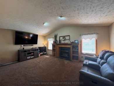 This beautiful home is located right by Indianhead Golf Course! on Indianhead Golf Club in Nebraska - for sale on GolfHomes.com, golf home, golf lot