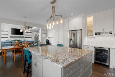 Nestled on the serene grounds of Tapawingo Golf Course, timeless on Tapawingo National Golf Club  in Missouri - for sale on GolfHomes.com, golf home, golf lot