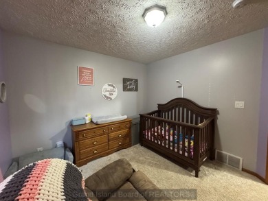 This beautiful home is located right by Indianhead Golf Course! on Indianhead Golf Club in Nebraska - for sale on GolfHomes.com, golf home, golf lot