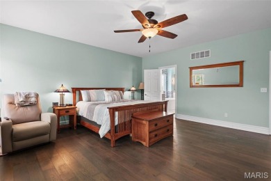 Nestled on the serene grounds of Tapawingo Golf Course, timeless on Tapawingo National Golf Club  in Missouri - for sale on GolfHomes.com, golf home, golf lot