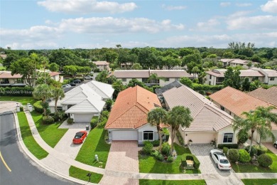 Step into luxury with this updated 3/2.5 gem located in the on Boca Lago Golf and Country Club in Florida - for sale on GolfHomes.com, golf home, golf lot