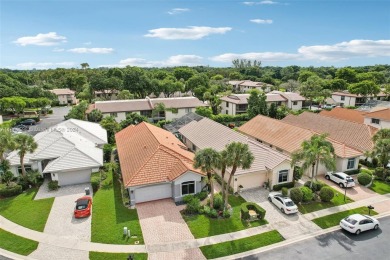 Step into luxury with this updated 3/2.5 gem located in the on Boca Lago Golf and Country Club in Florida - for sale on GolfHomes.com, golf home, golf lot