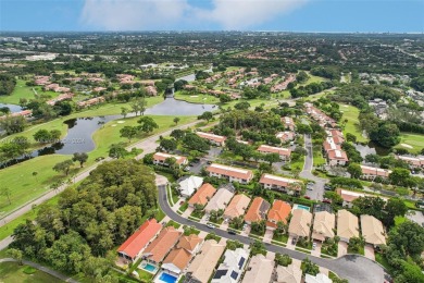 Step into luxury with this updated 3/2.5 gem located in the on Boca Lago Golf and Country Club in Florida - for sale on GolfHomes.com, golf home, golf lot