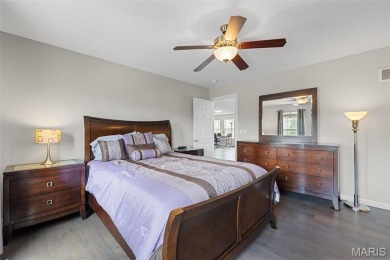Nestled on the serene grounds of Tapawingo Golf Course, timeless on Tapawingo National Golf Club  in Missouri - for sale on GolfHomes.com, golf home, golf lot