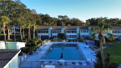 Charming 2nd Floor Furnished Condo in Live Oak Village - 55+ on Country Club At Silver Springs Shores in Florida - for sale on GolfHomes.com, golf home, golf lot