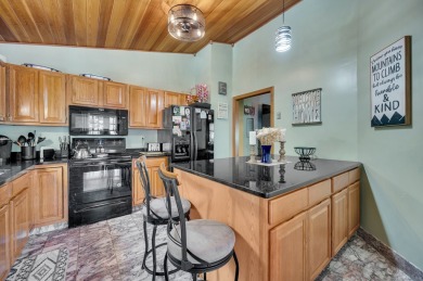 Set on a generous half-acre corner lot, this 3,400 sq ft home on Ailing Memorial Golf Course in Connecticut - for sale on GolfHomes.com, golf home, golf lot