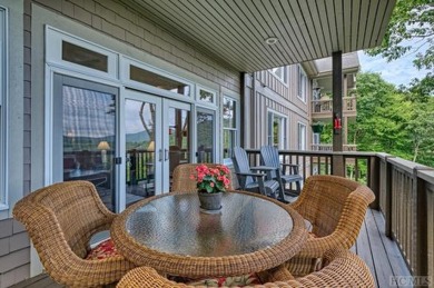 Experience luxury living in this 3-bedroom, 3-bath condominium on Old Edwards Club in North Carolina - for sale on GolfHomes.com, golf home, golf lot