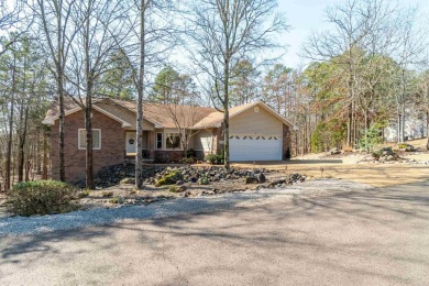 Great curb appeal with additional landscaping in this on Ponce De Leon Golf Course in Arkansas - for sale on GolfHomes.com, golf home, golf lot