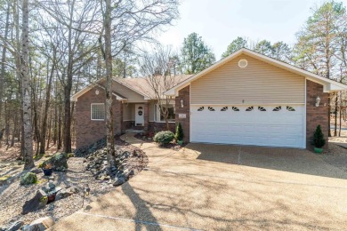 Great curb appeal with additional landscaping in this on Ponce De Leon Golf Course in Arkansas - for sale on GolfHomes.com, golf home, golf lot