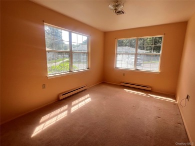 Great location. Corner unit Greenbriar Model with heated and on Leisure Village Golf Course in New York - for sale on GolfHomes.com, golf home, golf lot