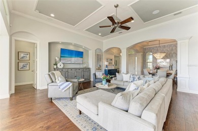 Come see this beautiful custom home in the cherished Legends Bay on IMG Academies Golf and Country Club in Florida - for sale on GolfHomes.com, golf home, golf lot