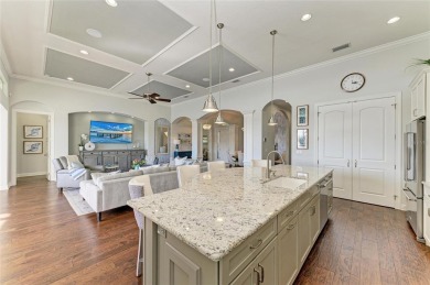 Come see this beautiful custom home in the cherished Legends Bay on IMG Academies Golf and Country Club in Florida - for sale on GolfHomes.com, golf home, golf lot