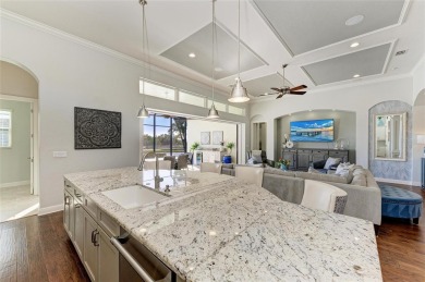 Come see this beautiful custom home in the cherished Legends Bay on IMG Academies Golf and Country Club in Florida - for sale on GolfHomes.com, golf home, golf lot