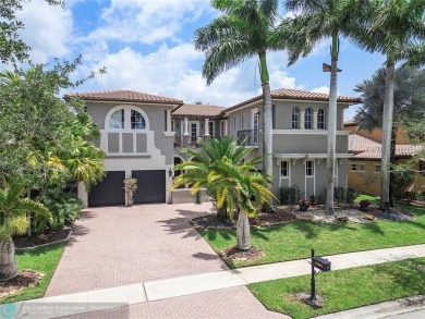 Stunning HOME in prestigious Edgewood at Heron Bay! This on Heron Bay Golf Club in Florida - for sale on GolfHomes.com, golf home, golf lot