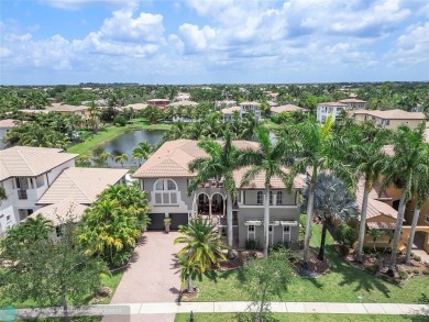 Stunning HOME in prestigious Edgewood at Heron Bay! This on Heron Bay Golf Club in Florida - for sale on GolfHomes.com, golf home, golf lot