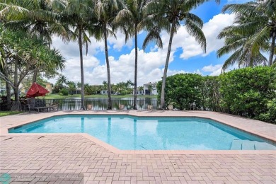 Stunning HOME in prestigious Edgewood at Heron Bay! This on Heron Bay Golf Club in Florida - for sale on GolfHomes.com, golf home, golf lot